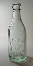 VTG Wunderlich Bros. Winona, Minn. Embossed 7oz Aqua Colored Glass Bottle picture