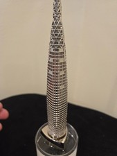 Large metal Lotte Tower one of tallest souvenir building replica picture