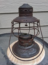 Missouri Pacific Handlan Buck Brass-Top Bell-Bottom Railroad Lantern Frame picture