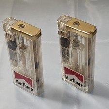 CLEAR MARLBORO CIGARETTE LIGHT UP LIGHTERS X2 Rare  picture
