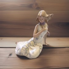 Unique  mid century  Lady Figurine sitting with wind blowing hair 6x6 picture