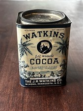 Almost Antique Watkins Cocoa Tin half filled with old marbles picture