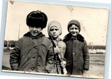 Soviet Photo Three Boys in Winter Clothes One Holding Toy Rifle Vintage picture