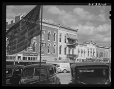 Photo:Nevada Missouri 1942 Downtown Main Street Storefronts Automobiles picture