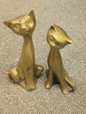 These are vintage mid-century modern solid brass Siamese cat figurines picture