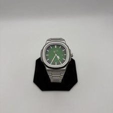 Lucky Fours watch green dial stainless steel , new battery picture