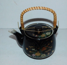 NEAT OLDER BLACK TEAPOT WITH FLORAL DESIGN MADE IN JAPAN picture