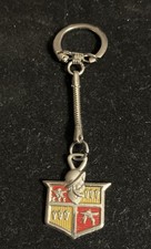 Vintage DeSoto Automobile Crest Metal Keychain Pendant Memorabilia picture