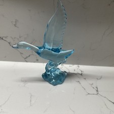 Blue Glass Duck In Flight picture