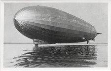 Vintage Graf Zeppelin LZ127 Photo Postcard Airship Skimming Low Over Water picture