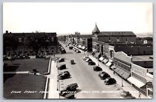 Falls City NE~Conoco Oil Truck~Safeway~JC Penney~RRPC~Guy Lichty Insurance~1957 picture
