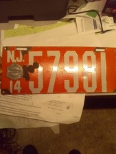 1914 NJ Porcelain License Plate - Orange Shade Variant w/ Badge picture