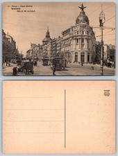Vintage Madrid Postcard Calle de Alcalá Metropolis Building Tram Hauser y Menet picture