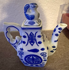 Chinese Style Blue & White Porcelain Teapot with Figural Lid picture