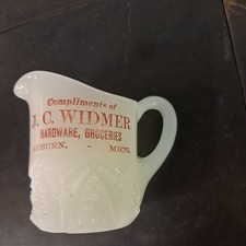 Auburn Michigan J. C. Widmer HARDWARE GROCERIES Souvenir Glass Creamer white picture