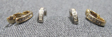 Vintage unmarked clear rhinestones silvertone pierced + goldtone clip earrings picture