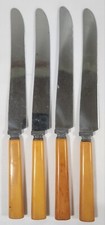 (4) Vtg Sta-Brite Butter Knives Stainless Steel Butterscotch Bakelite Handle picture
