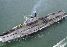 An aerial view of the aircraft carrier HMS Hermes its deck lined b- Old Photo picture