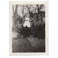 Vintage Snapshot Photo Girl Feeding Chickens in Yard 1910s B&W Photograph picture