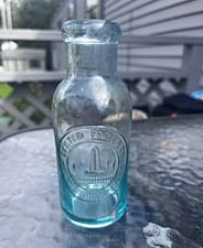 Blue Embossed Glass Bottle w/ 