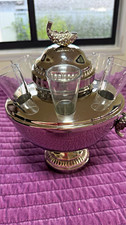 A silver caviar bowl with vodka glasses will make an elegant table decoration. picture