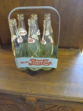 Vintage Pepsi cola carrier and bottles picture