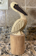 Vintage Hand Carved Wooden Pelican Sitting On Log Dock Pier picture