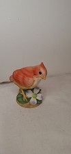 Andrea Cardinal Porcelain Figurine 6350 with Flower picture