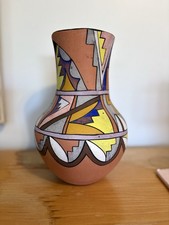 Vintage Jemez Pueblo polychrome ceramic vase with geometric painted designs. picture