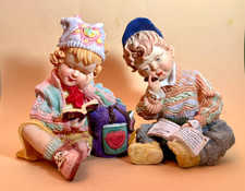 Pair of Vintage and Rare Meerchi (MRH) Young Boy and Girl Reading Figures picture