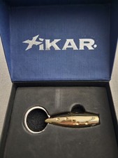 Xikar Twist Bullet Punch  #007 NIB Brass Plated Gold Color picture