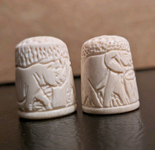 Pair of White Carved Bovine Bone Scene Sewing Thimbles, Saharan Animal Motif picture