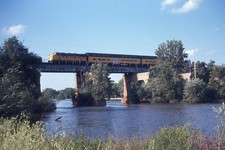 JM ORIG SLIDE CNW NORTH WESTERN F7A W/COMMUTER TRAIN ON BRIDGE IN 1968 picture
