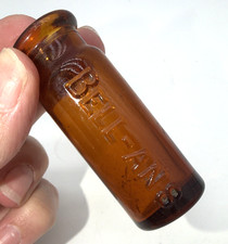 Antique Honey Amber Bell-Ans Cylindrical Bottle Early 1900s Small Size Medicine picture