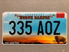 NORTH DAKOTA LICENSE PLATE LEGENDARY/BUFFALO RANDOM LETTERS/NUMBERS NICE picture