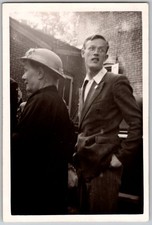 Vtg B&W Snapshot Young Man Double Breasted Suit Woman Hat Brick Wall 1940 picture
