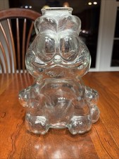 Vintage Anchor Hocking Garfield the Cat Clear Glass Penny Coin Piggy Bank picture