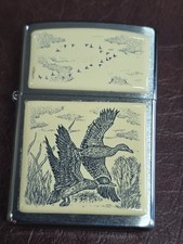 Zippo lighter  2002 SCRIMSHAW ZIPPO FLYING DUCKS  Extremely Rare. Very Nice picture