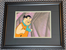 1970s FLINTSTONES PRODUCTION CEL OF FRED ON A HAND PAINTED PRODUCTION BACKGROUND picture