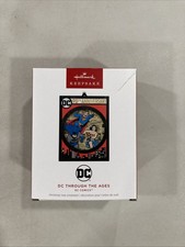 2025 Hallmark DC Comics Through the Ages 90th Anniversary Keepsake Ornament Tear picture
