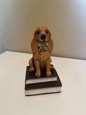 Cocker Spaniel Figurine Sitting On Top of Books Dog Statue picture