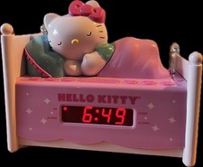 HELLO KITTY®  The Hello Kitty Sleeping Kitty Alarm Clock Radio with Night Light picture