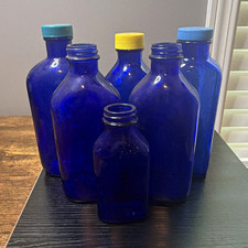 Lot of 6 Cobalt Blue Glass Medicine/Apothecary Bottles w/ Caps (3) picture