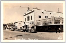 Street Scene Forks WA, Olympic Pharmacy, Super IGA Market, RPPC Postcard picture