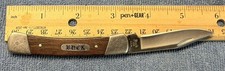 Vintage Buck Script 704 Pocket Knife - wooden handle single clip blade picture