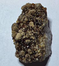 Spectacular chunk of Spessartine Garnet In matrix picture