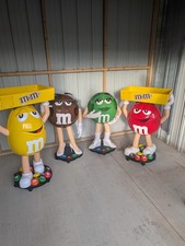 Collectable M&M's Character Candy Displays Red Green Yellow Brown on wheels picture