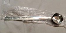 Dutch bros stainless steel measuring scoop picture