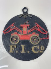 Vintage FIC Fireman Fire Truck Insurance Company Cast Aluminum Plaque Wall Decor picture