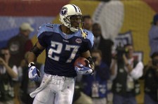 Titans running back Eddie George after a touchdown run as the St L- Old Photo picture